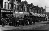 Queuing for Potatoes at Warwick Fruit & Veg Stores, Forest Road, Walthamstow, London. c.1910