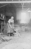 Joseph Mason, Blacksmith with Ratcliff his assistant at his forge in Grange Road, Leyton. c.1870.