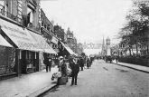 The Pavement and Clock Tower, Clapham High Street, Clapham, London. 19019.