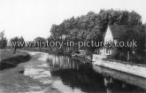 View of The River Stour from the Road Bridge in the centre of Bures. Essex. c. 1914